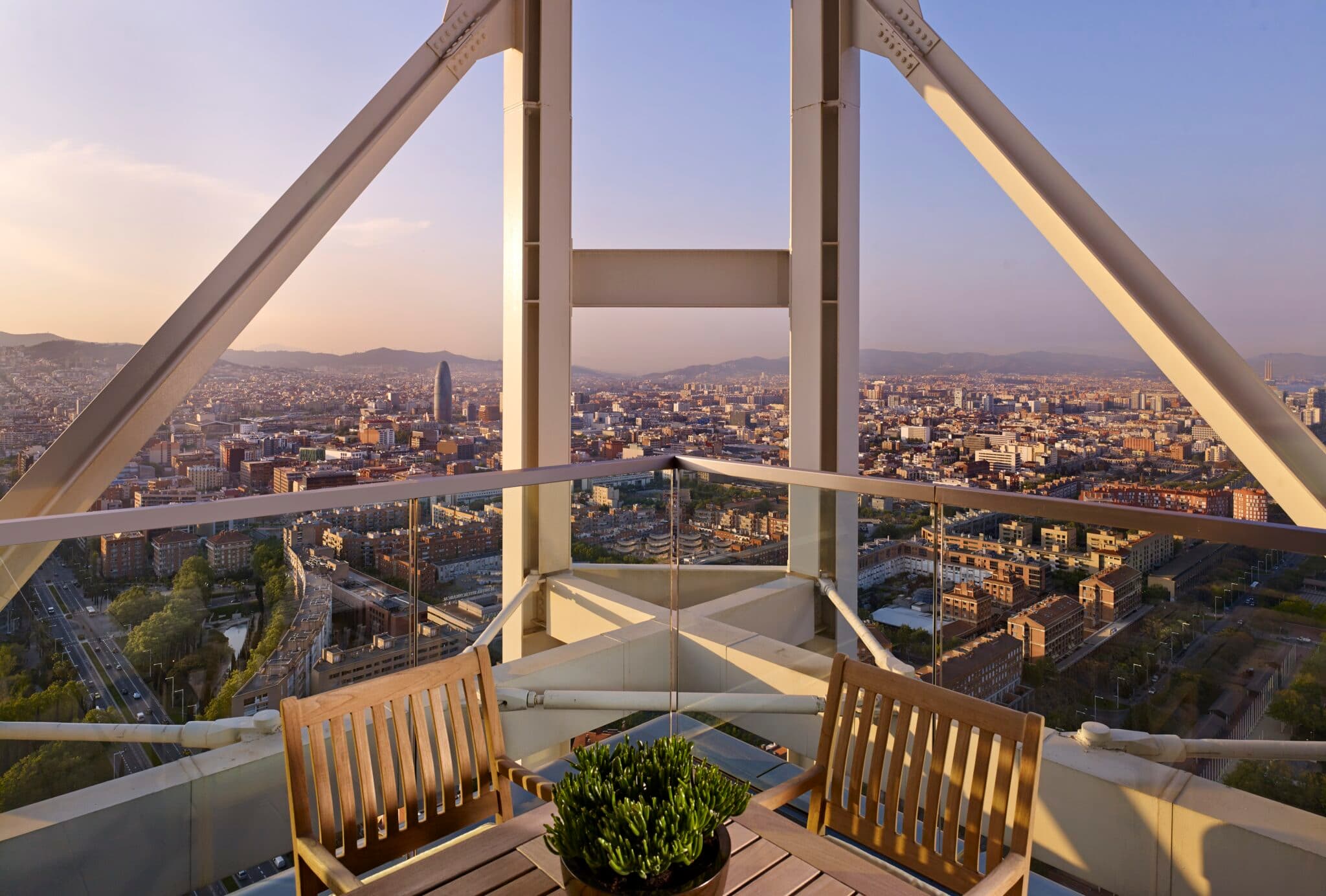 Hotel pool with Barcelona cityscape